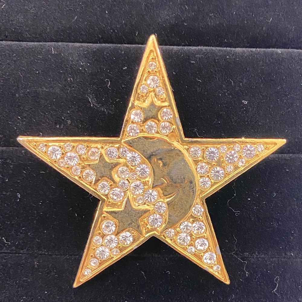 Gold tone and Cz star and moon brooch